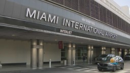 Woman stabbed at Miami International Airport, one held
